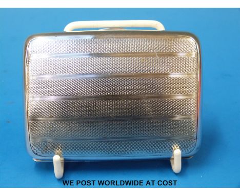 An engine turned silver cigarette case B'ham 1916, with gilt interior (85g)
