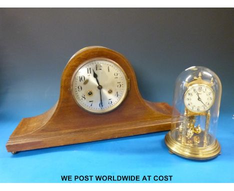 A large Napoleon hat style mantel clock with two-train movement stamped DRGM, together with an anniversary clock under domed 