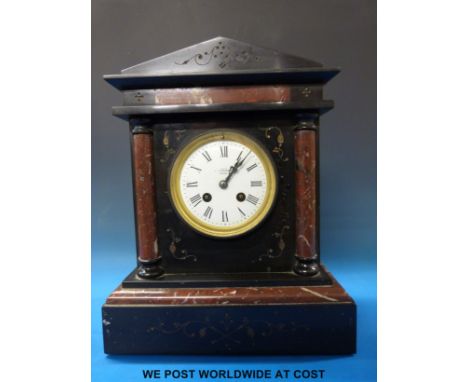 A two-train mantel clock striking on a gong with Roman numerals and "Mappin & Webb London" stamped to face. 