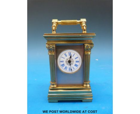 Aiguilles miniature carriage clock with Corinthian columns to corners, the enamel dial with blue Roman numerals, height inclu