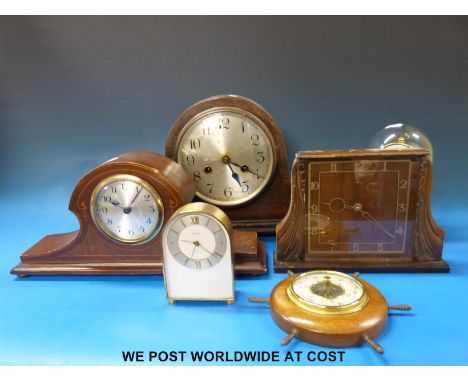 An Art Nouveau style mantel clock, oak two train mantel clock, anniversary clock, two others and a small 'ship's wheel' barom