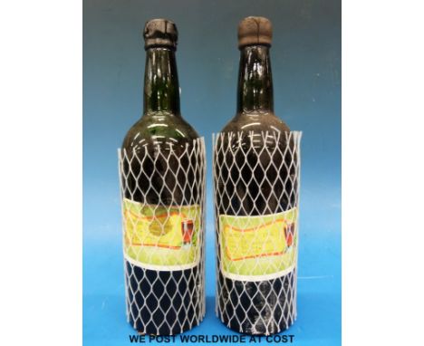 Two bottles of 1964 vintage port with wax seals