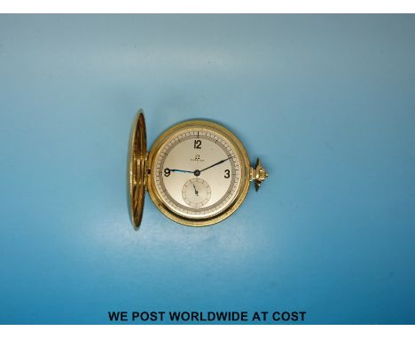 Omega full hunter yellow metal cased pocket watch with engine turned case marked 14k, yellow metal inlay and vacant cartouche