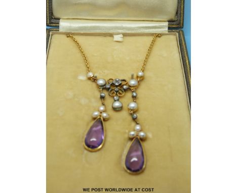 A gold necklace set with pearls, diamonds and amethyst cabochons in original Skinner & Co London box