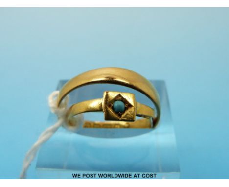 A 22ct gold wedding band (size R, 2.8g) and an 18ct gold ring set with a turquoise stone