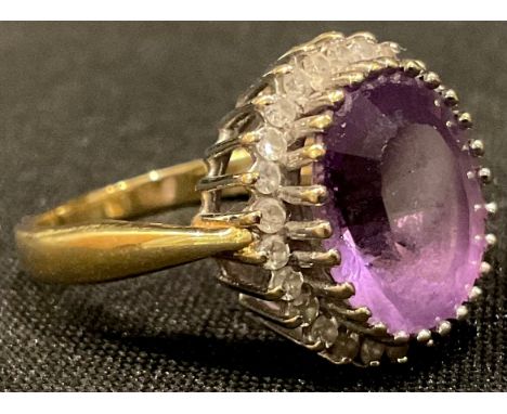 An 18ct gold amethyst and diamond ring, size P/Q, 6.5g 