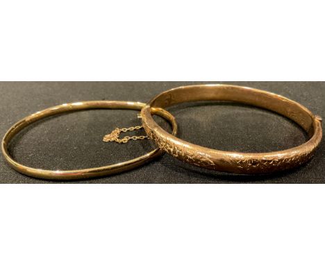A 9ct rose gold hinged bangle, marked 375, 8.7g; another, marked 375, 3.8g (2) 