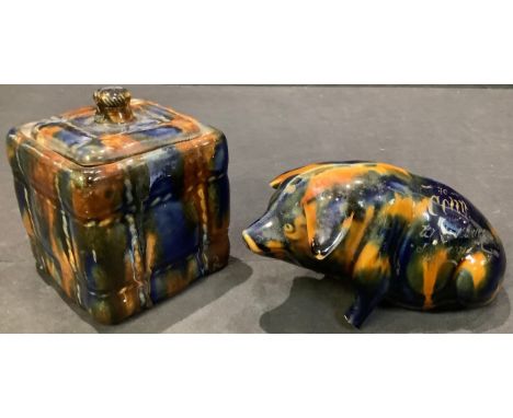A Bourne Denby majolica piggy bank, To Colin from Uncle Maurice, Jan. 1930; a Denby majolica basket shaped caddy and cover, k