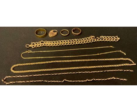 A 9ct gold fancy link necklace, 42cm long, 5.2g; a 9ct gold wedding band, plain, 2.6g; a 15ct gold ring set with two old cut 