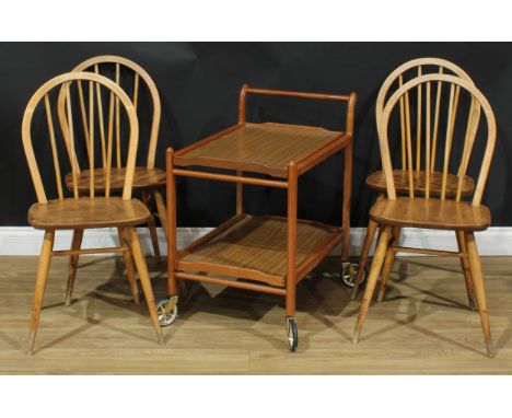 A set of four Ercol elm and beech Windsor chairs, 86cm high, 40cm wide, the seat 29cm deep; a Staples &amp; Co serving trolle