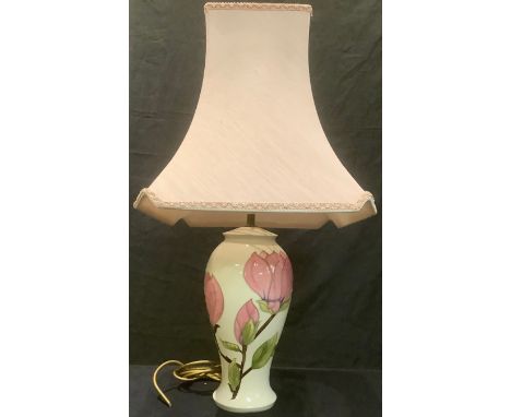 A large Moorcroft Magnolia pattern lamp with shade 