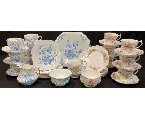 A Royal Albert Moss Rose tea service for six comprising side plates, cream jug, sugar bowl, cups and saucers; another, Coalpo