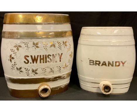 A large Victorian Scotch Whisky barrel; another, Brandy, smaller 