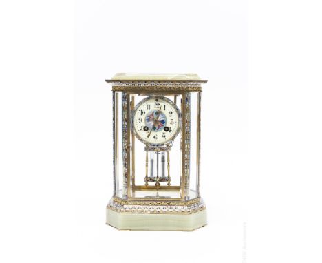 French chinoiserie cloisonné decorated gilt metal carriage style clock with onyx top and base. Time and strike movement, with
