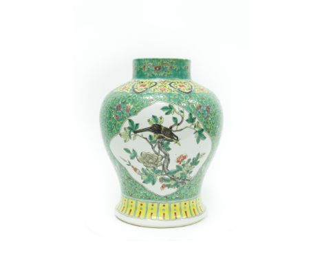 Chinese polychrome enameled jar, Late Qing/Republic period. Thickly molded with a tall neck and inverted pear-form body that 