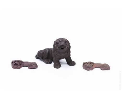 Yixing Lion Figure & (2) Chopstick Holders. Lion figure potted in dark-hued clay, the feline seated on his hind legs and tail