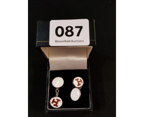 PAIR OF SILVER AND ENAMEL CUFF LINKS