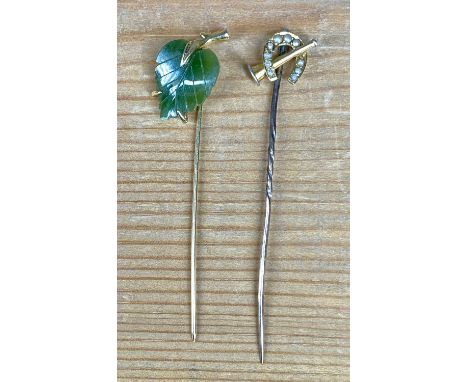 TWO VICTORIAN STICK PINS, 15ct gold horseshoe and hunting horn design set with seed pearls, and yellow metal and green jadeit
