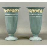 PAIR OF WEDGWOOD EMBOSSED QUEEN'S WARE VASES, of tapering circular form, circular bases, 28cms (h)