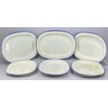 PEARLWARE BLUE FEATHER EDGED OVAL PLATES, c. 1820-30, largest 47 x 35.5cms (6) Provenance: The