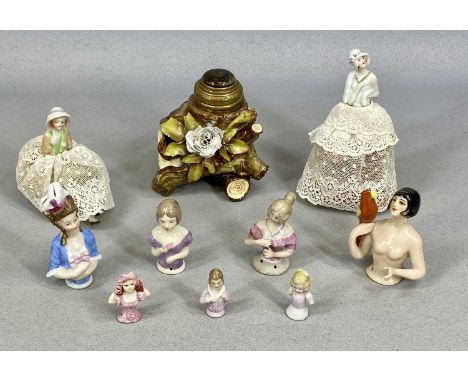 COLLECTION OF NINE GERMAN PORCELAIN HALF DOLL ORNAMENTS, along with a continental porcelain inkwell, naturalistic form moulde