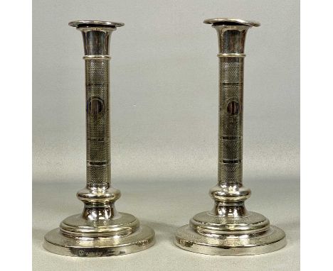 PAIR OF ELKINGTON & CO. PLATED CANDLESTICKS, with engine turned decoration, removable nozzles, cylindrical stems, and stepped