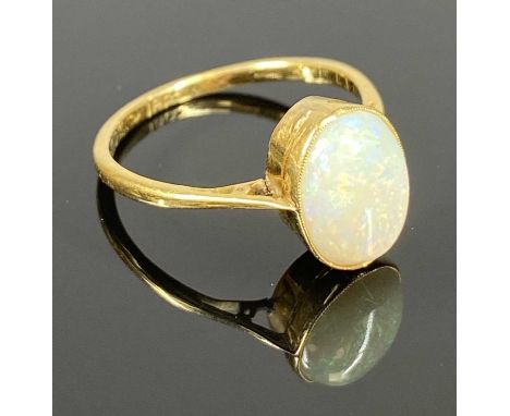 18CT GOLD RING SET WITH OVAL OPAL, size K/L, 2gmsProvenance: private collection Conwy
