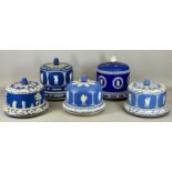 FIVE WEDGWOOD STYLE BLUE & WHITE JASPERWARE CHEESE DISHES & COVERS, 27cms (h) the tallest