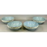 FOUR WEDGWOOD EMBOSSED QUEEN'S WARE CIRCULAR FRUIT BOWLS, each 26.5cms (diam.) Provenance: The