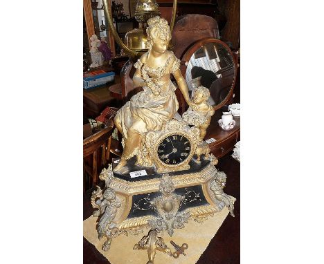 French ormolu and onyx mantel clock, with figural and cherub decoration