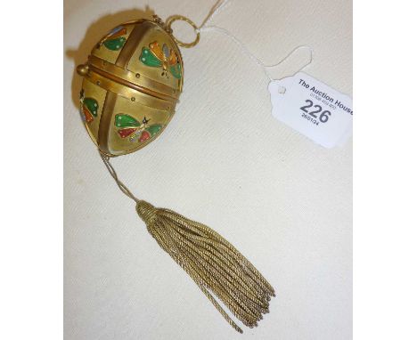 An egg form sewing etui, containing original gilt thimble, ribbon threader, needle case, embroidery scissors and bodkin - cas