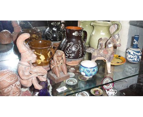 Assorted pottery inc. Iznik bowl, Aztec figures, slipware tyg (A/F), a Kew Gardens green glazed pottery jug, a Torquay potter