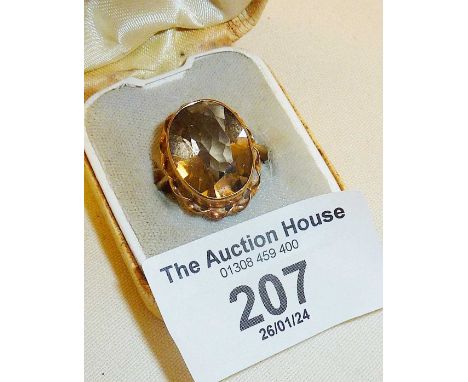 9ct gold dress ring set with a smoky topaz? stone. Approx. UK size N and weight 5.5g