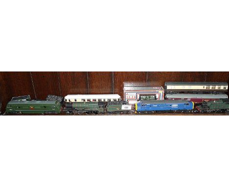 4 various Lima locomotives inc. 4-6-0 King George V, a G.W.R. diesel with 2 carriages and 4 rolling stock (1 boxed)