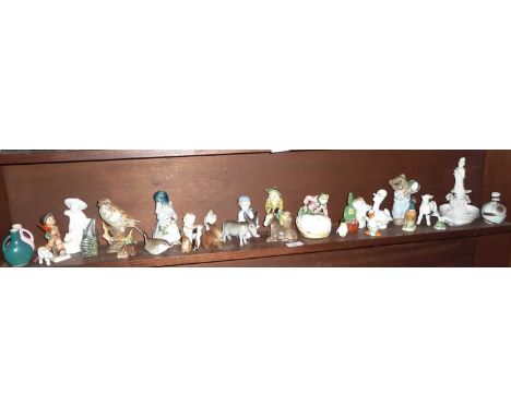 Collection of china animal ornaments (one shelf)