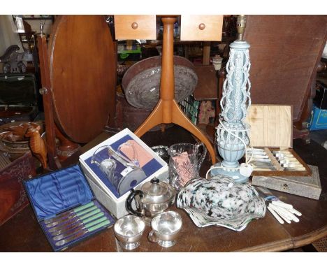 Assorted glassware, cased cutlery, a silver plated teaset and a pottery table lamp