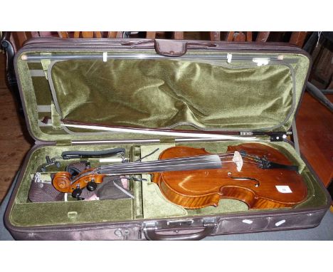 Modern viola in case with bow and labelled "The Messina"