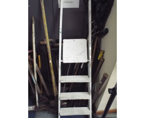 A Large Collection of Garden Tools to Include Rake, Garden Shovels, Forks, Step Ladder, Edging Shears etc