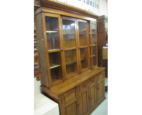 Late 19th/early 20th Century oak two stage cabinet backed dresser or sideboard, with an arrangement of drawers and cupboards.