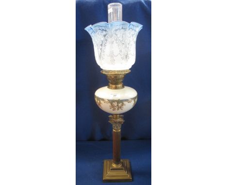 Early 20th Century double burner oil lamp with Corinthian brass column, floral reservoir and pale blue etched shade and clear