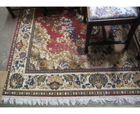 Large Persian style carpet with foliate decoration. (B.P. 24% incl. VAT)