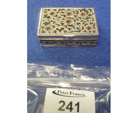 White metal floral and foliate decorated rectangular snuff type box.(B.P. 24% incl. VAT)