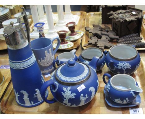 Tray of Wedgwood blue and white Jasper ware teaware items, some with silver rims, to include: baluster teapot; sucrier; milk 