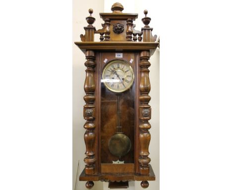 Early 20th Century walnut two train Vienna type wall clock.(B.P. 24% incl. VAT)   CONDITION REPORT:  We do not test if workin