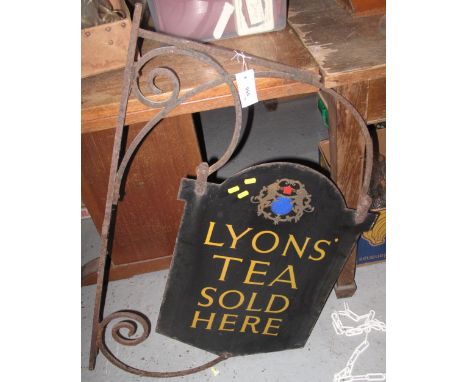 Original Lyons' tea double sided metal advertising sign, 'Lyons' Tea Sold Here' on a wrought iron wall bracket.(B.P. 24% incl