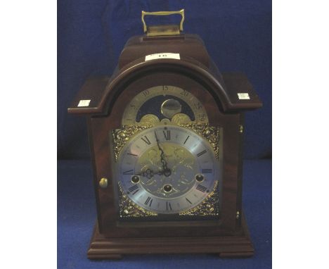 Modern Hermle three train bracket type mantel clock, with rolling moon.(B.P. 24% incl. VAT)