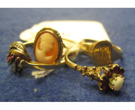 Four 9ct gold dress rings including cameo shell, opal and signet, 10.5g approx. (4)(B.P. 24% incl. VAT)