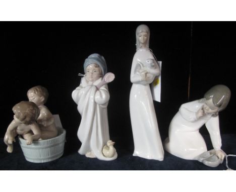 Three Lladro Spanish figure groups together with Nao porcelain figure of a female, together with one Lladro certificate.  (4)