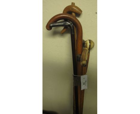 Bundle of assorted walking canes and sticks including horn handle, ceramic handle and silver mounted.  (6)(B.P. 24% incl. VAT