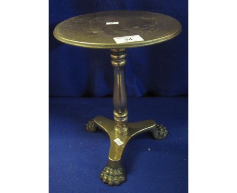 19th Century small brass tripod table raised on three paw feet.(B.P. 24% incl. VAT)